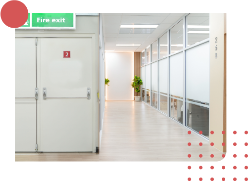 fire safety door and emergency exit pathway in a business building